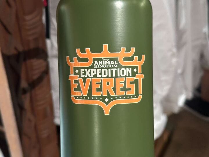 Green water bottle with "Animal Kingdom Expedition Everest" logo in orange and white text on the front.