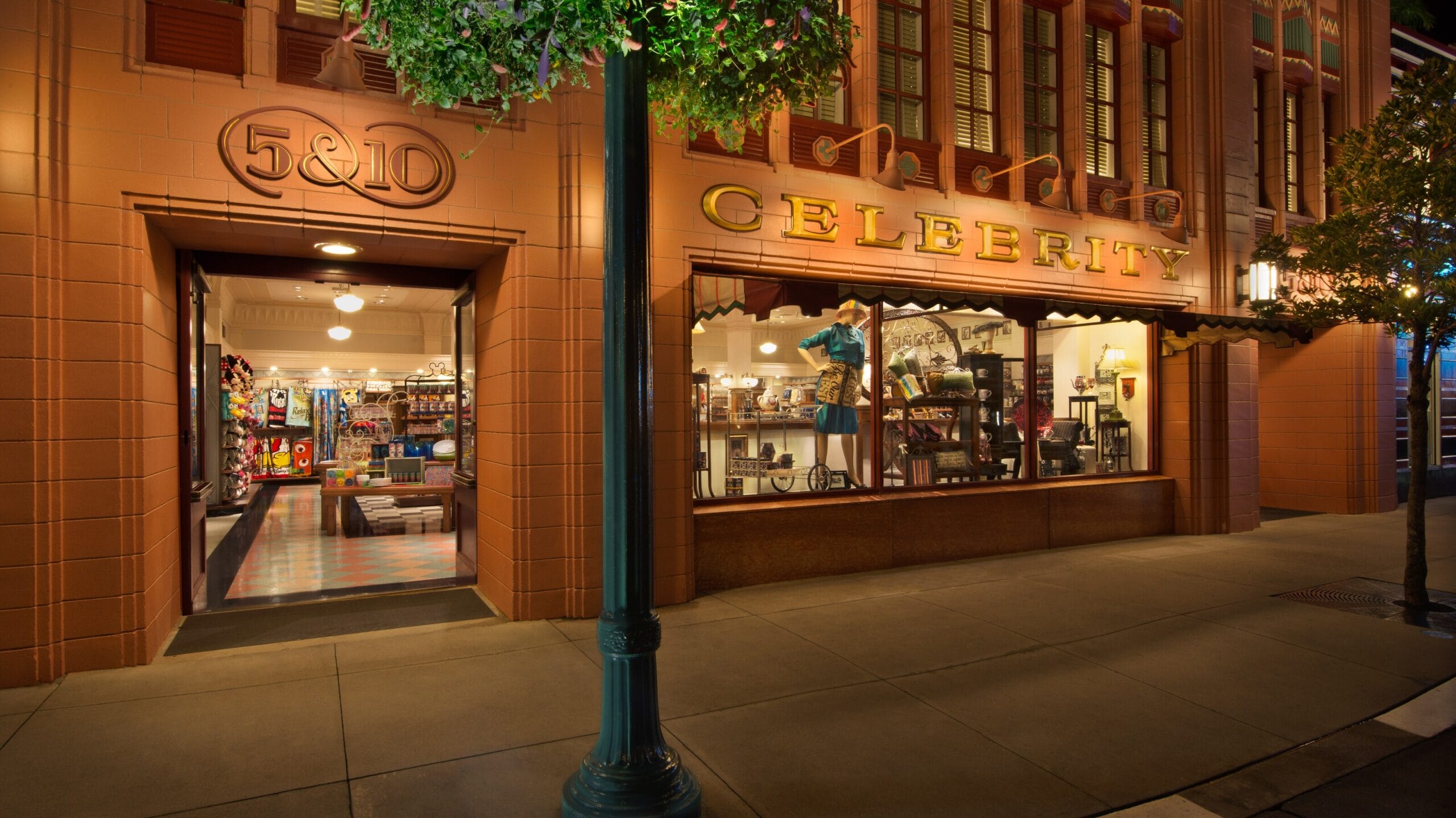 A brightly lit vintage store with "5 & 10" signs displays Disney merchandise and a Little Mermaid hat at night.