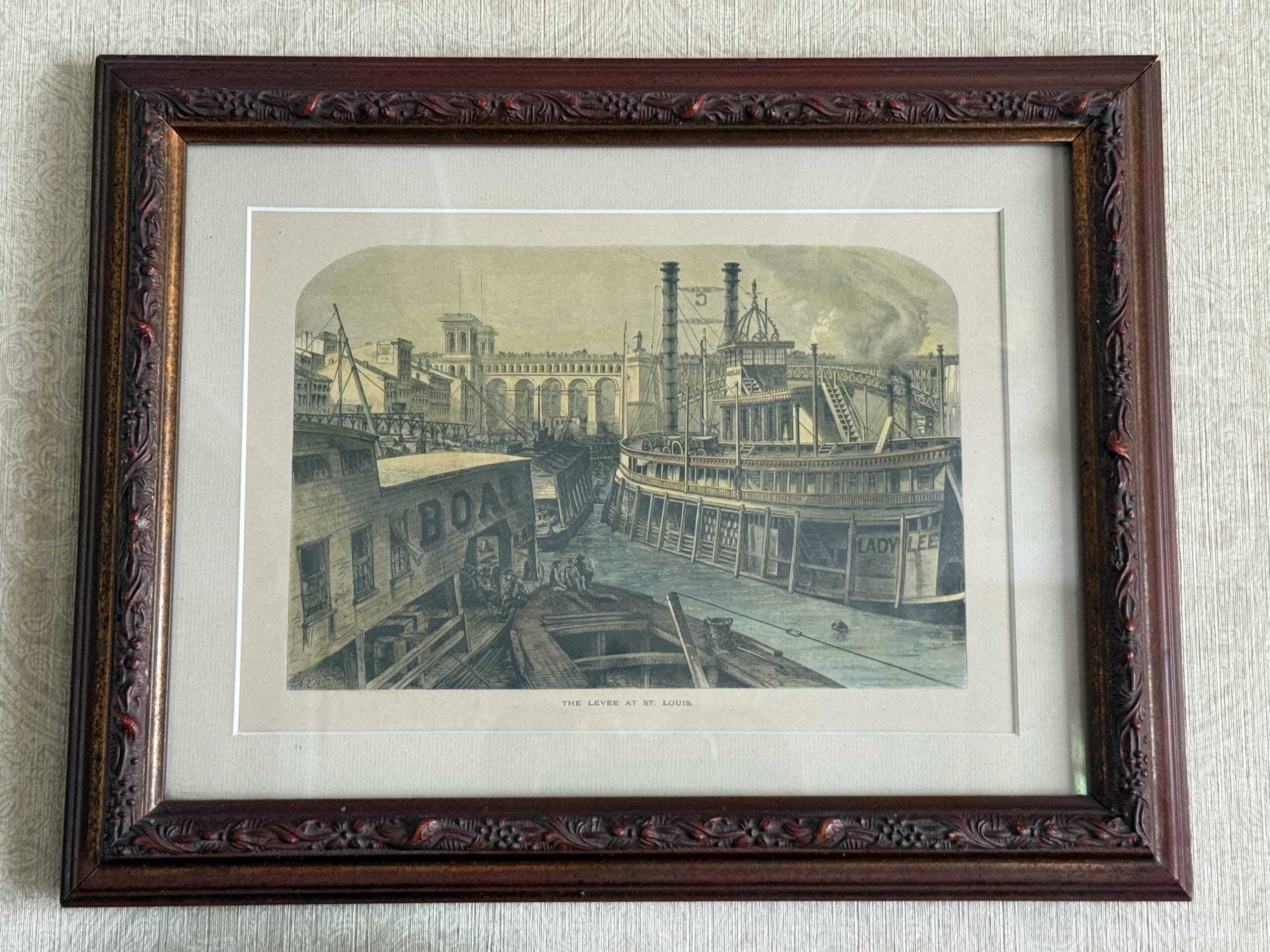Framed vintage print of steamboats docked, reminiscent of the Liberty Square Riverboat at Magic Kingdom.