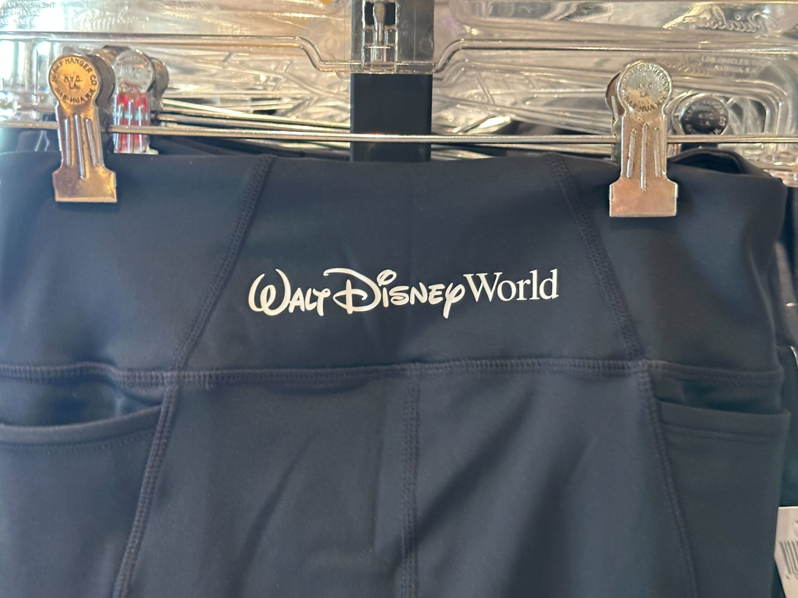 Black leggings featuring the "Walt Disney World" logo—perfect WDW merch for Disney merchandise collectors.