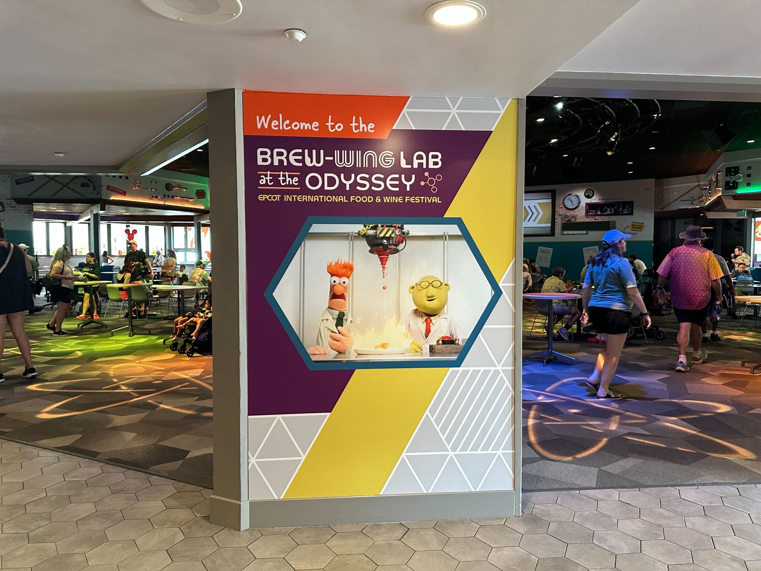 Colorful sign with Muppet characters for Brew-Wing Lab at the New Food & Wine Festival, EPCOT.