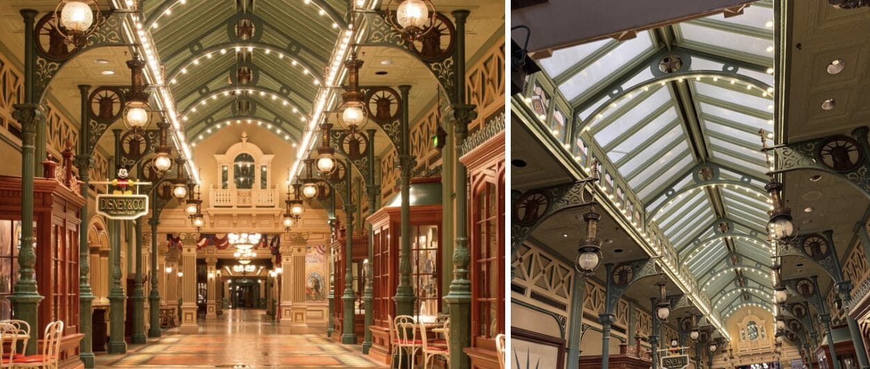 Ornate indoor arcade with skylights, vintage lights, and decorative green and gold metalwork on Main Street U.S.A.