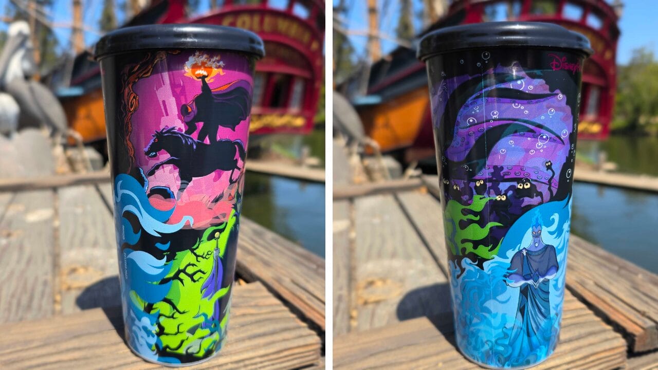 Two Halloween Travel Tumblers with Villain-Inspired art, set on a dock at Disneyland Resort with a red boat and water behind.