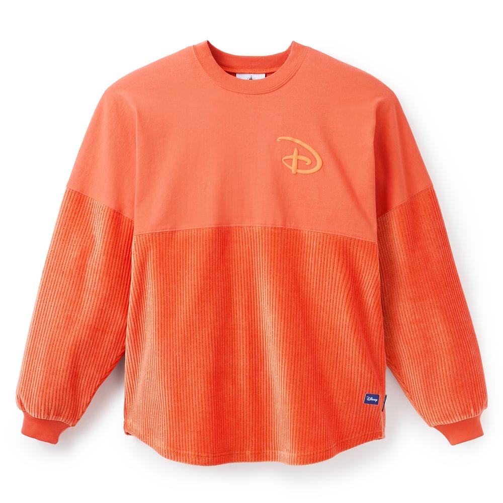 Orange long-sleeve crewneck from the Pumpkin Spice Collection with textured lower half and a stylized "D" logo on the chest.