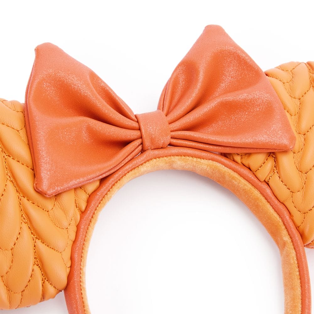 Pumpkin Spice orange headband with a shimmery bow and quilted, wing-like accents, perfect for fall.