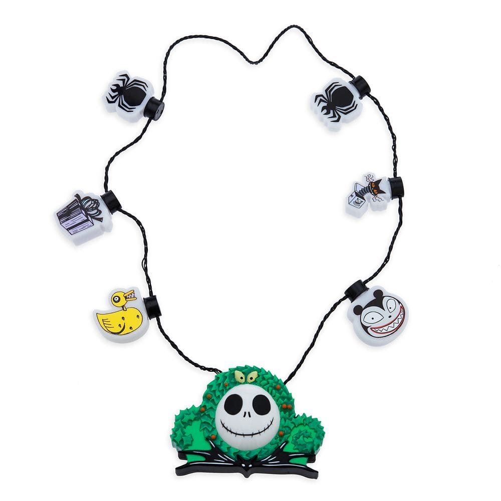 Black necklace with Nightmare Before Christmas charms, including Jack Skellington, a yellow duck, spiders, and presents.