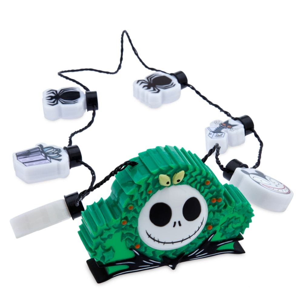 A string of Nightmare Before Christmas-themed lights with a green Jack Skellington wreath as the centerpiece.