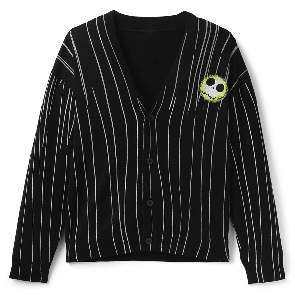 Black cardigan with white vertical stripes and a green smiling skull patch on the chest.