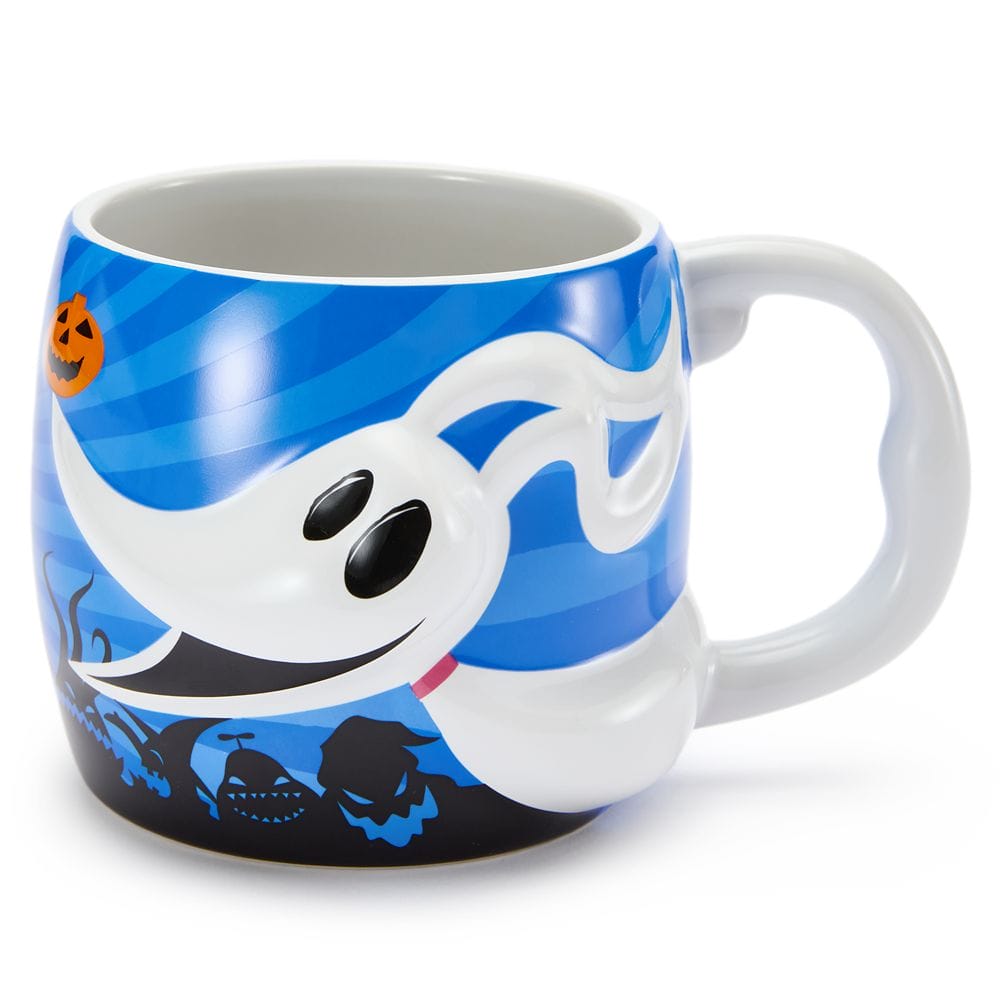 A blue mug featuring a white ghost dog and Halloween-themed pumpkins and faces along the bottom.
