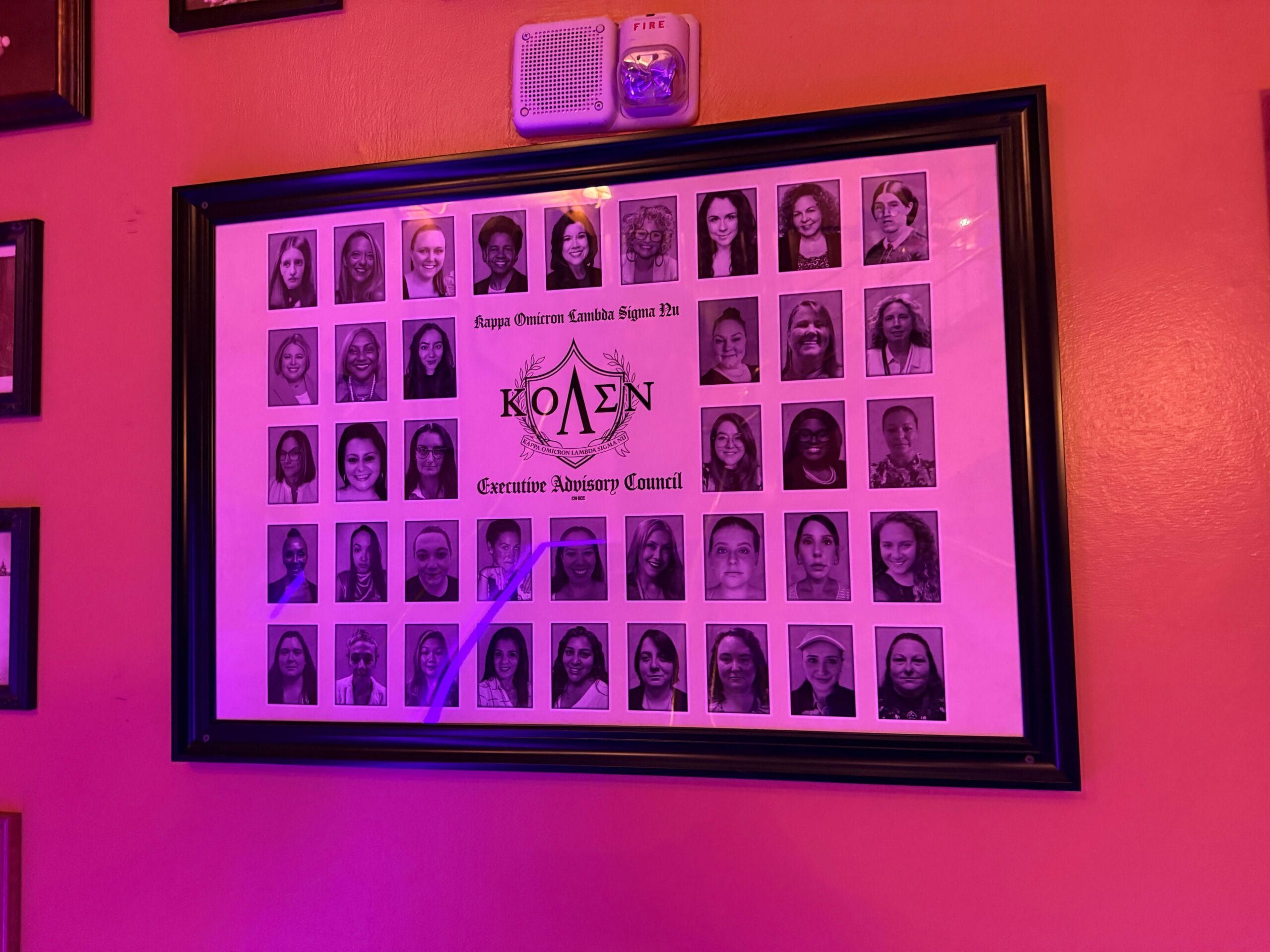 Framed collage of black-and-white headshots and Greek letters, as seen on the Full Tour of Sorority Witches.
