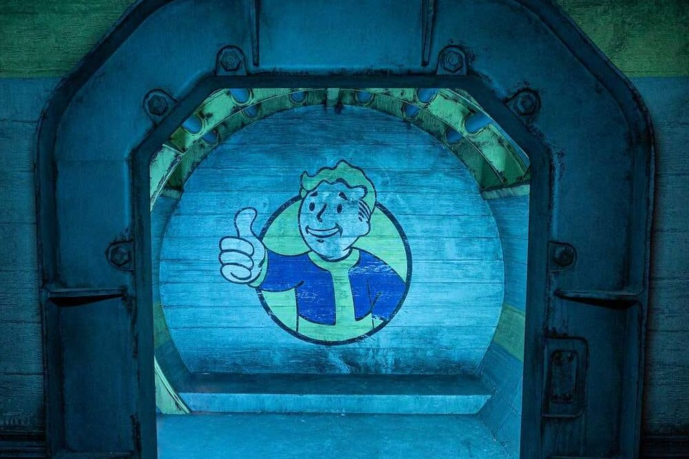 A vault door opens to reveal the Vault Boy logo on a blue wall, blending Fallout with Five Nights at Freddy's vibes.