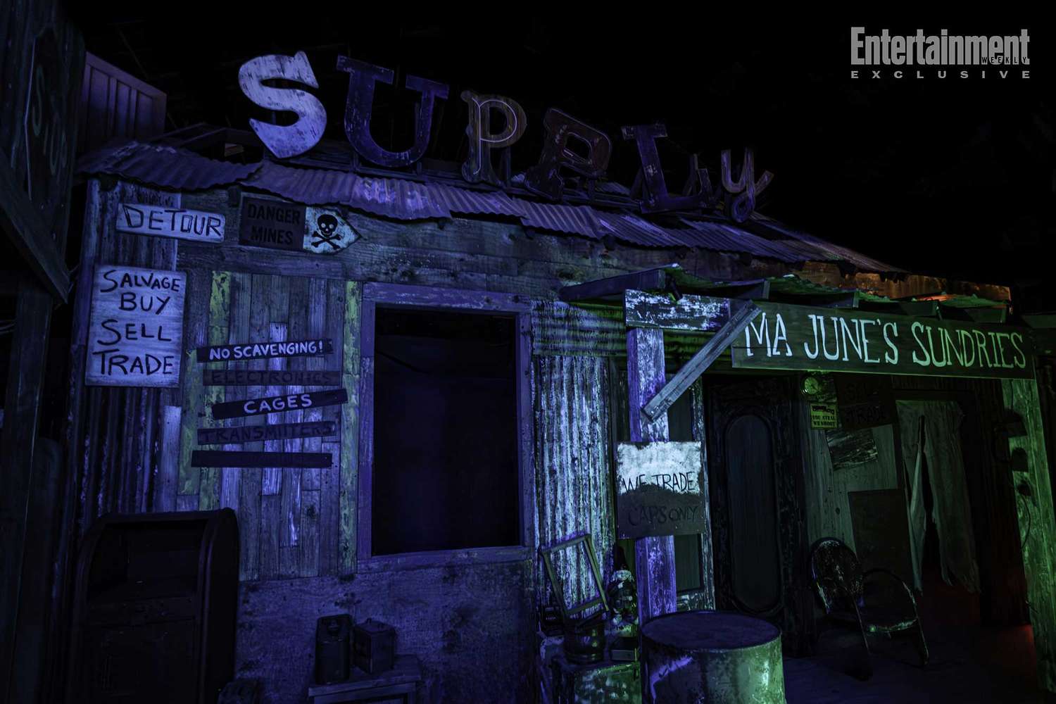 A dimly lit, rundown storefront labeled “SUPPLY” and “MA JUNE’S SUNDRIES,” evoking a Five Nights at Freddy's vibe.