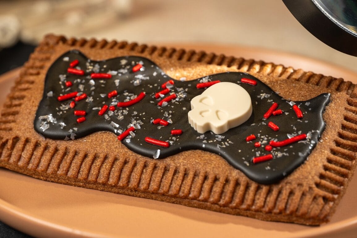 Debuting at Disney's Hollywood Studios, this chocolate pastry features black icing, red sprinkles, and a white chocolate skull.