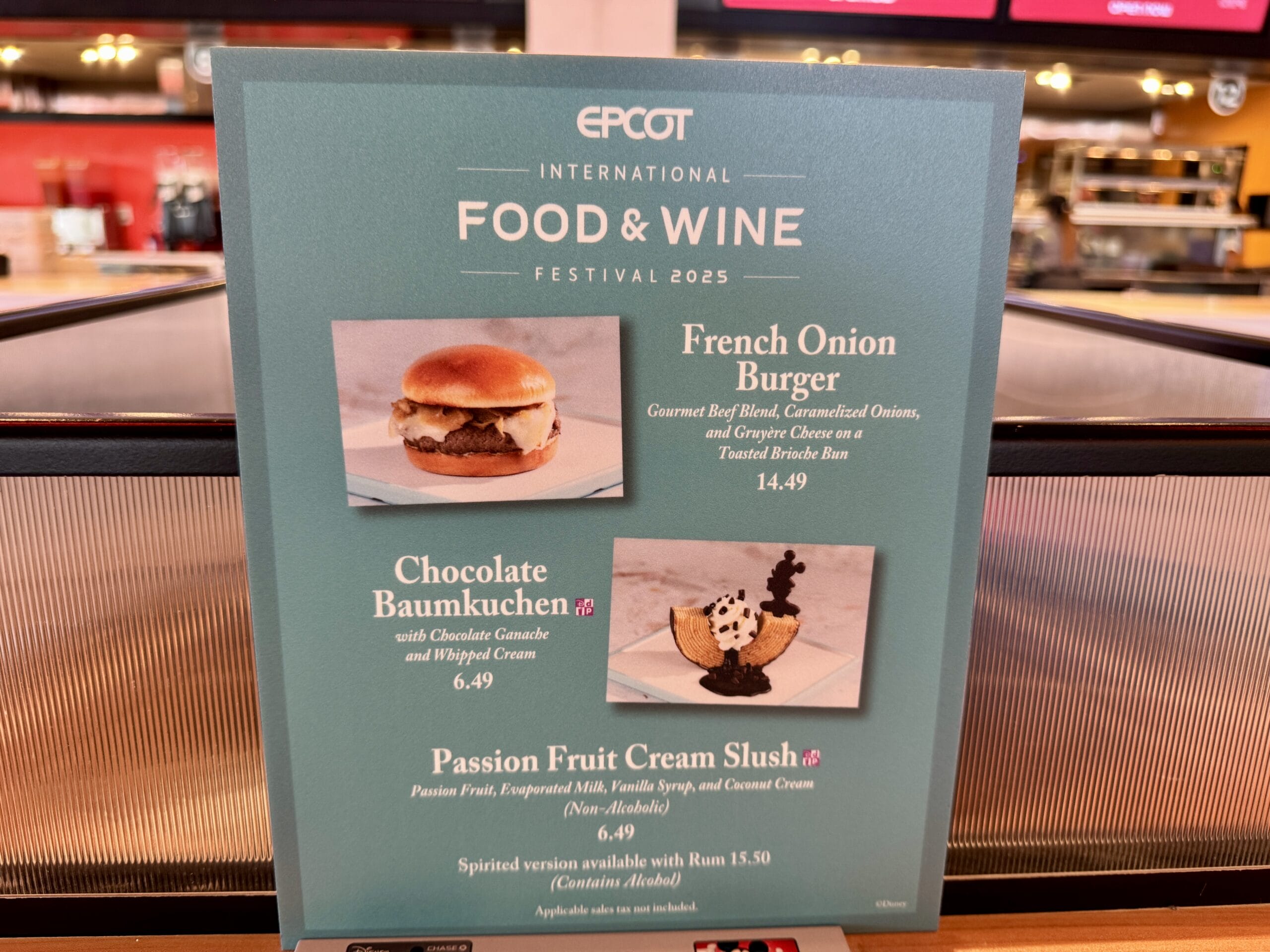 New Food & Wine finds at EPCOT 2025: burger, chocolate baumkuchen, passion fruit slush, and prices revealed.