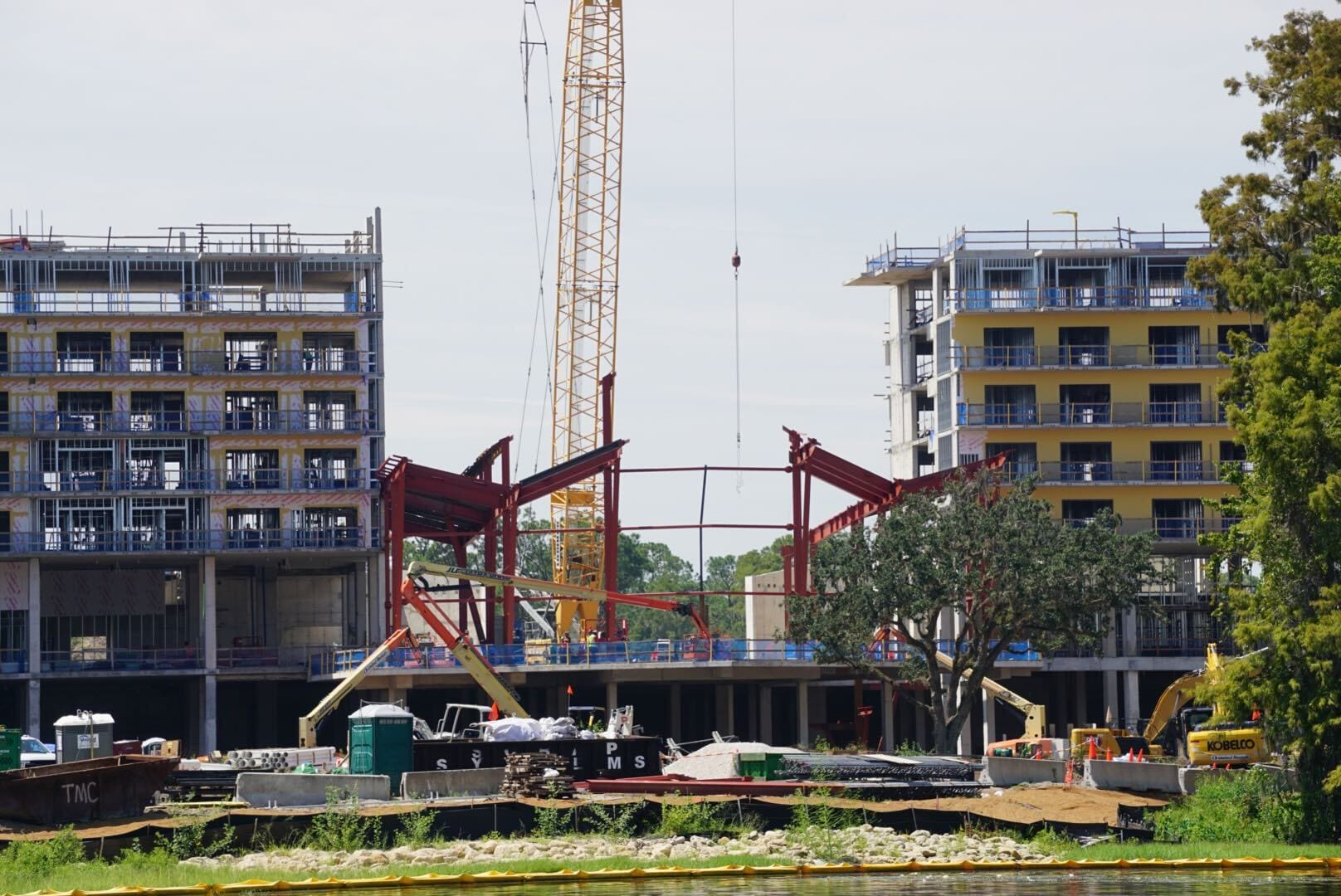 A construction site with cranes and steel frames highlights the latest progress in the Lakeshore Update.