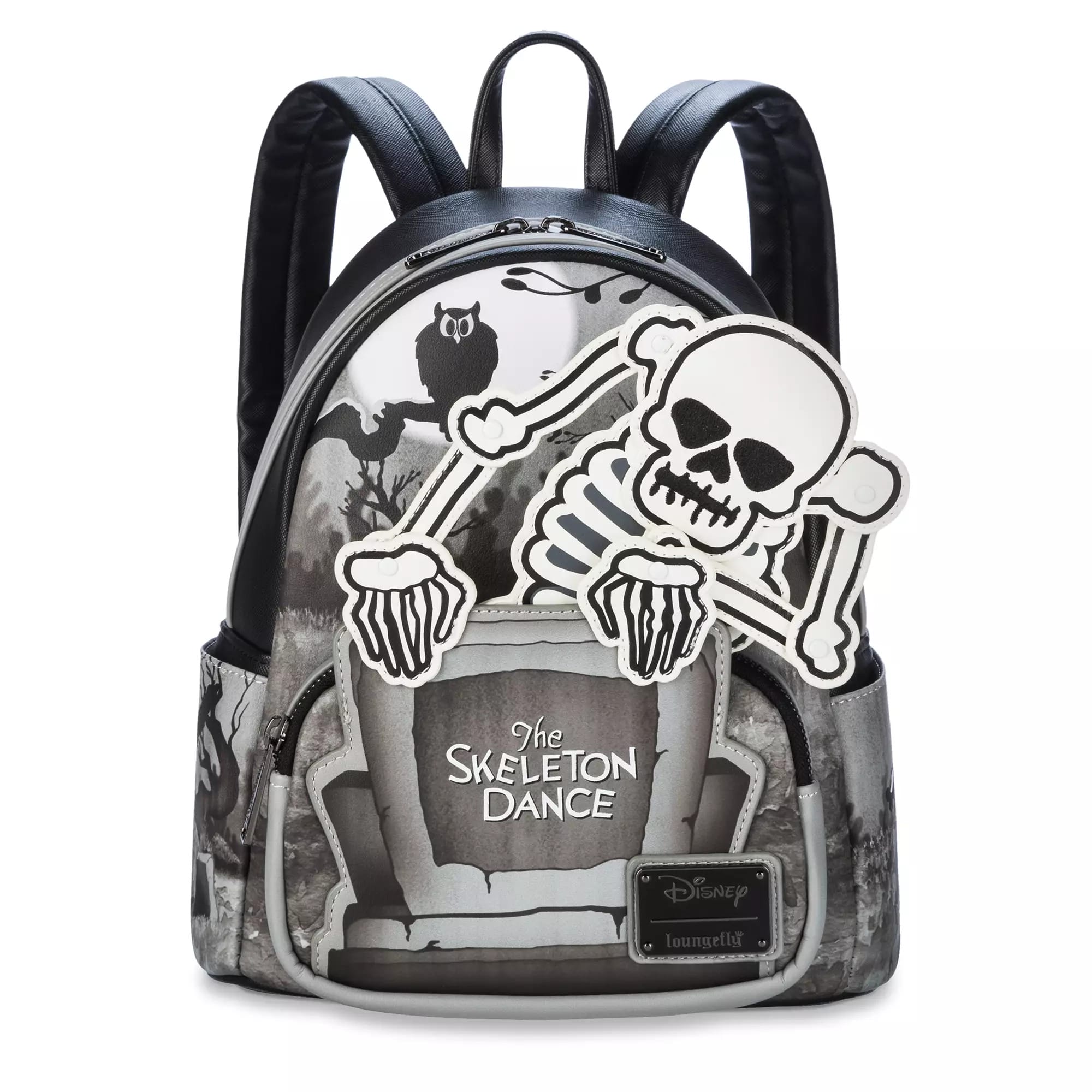 A Glow-in-the-Dark Loungefly Skeleton Dance backpack with cartoon skeletons and spooky black-and-white Disney details.
