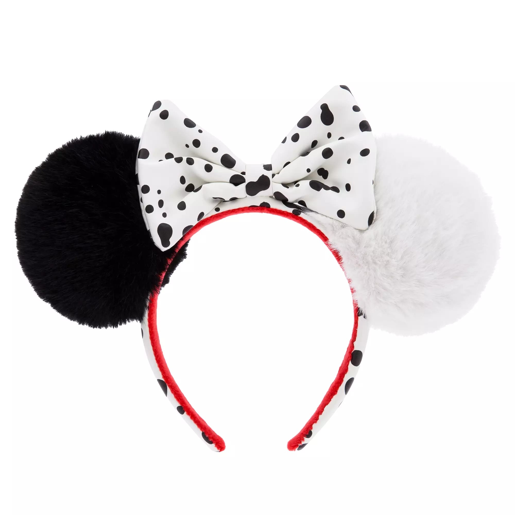 Headband with black and white fuzzy ears and a white bow with black spots, inspired by 101 Dalmatians.