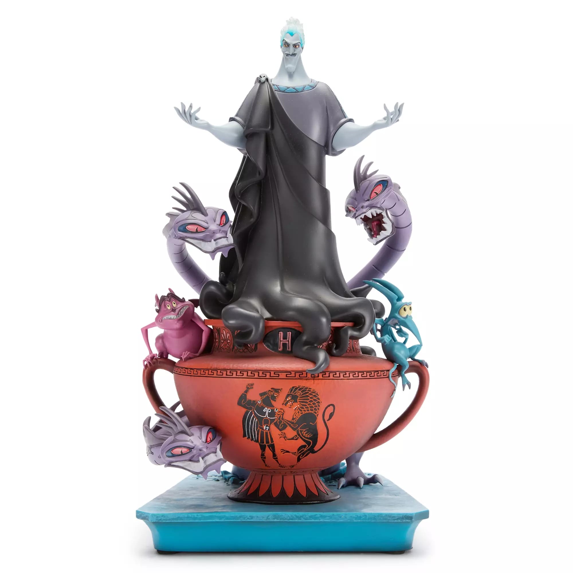 A Hades figurine stands in a teacup with mythic creatures and snakes, perfect for Disney Villains merchandise fans.