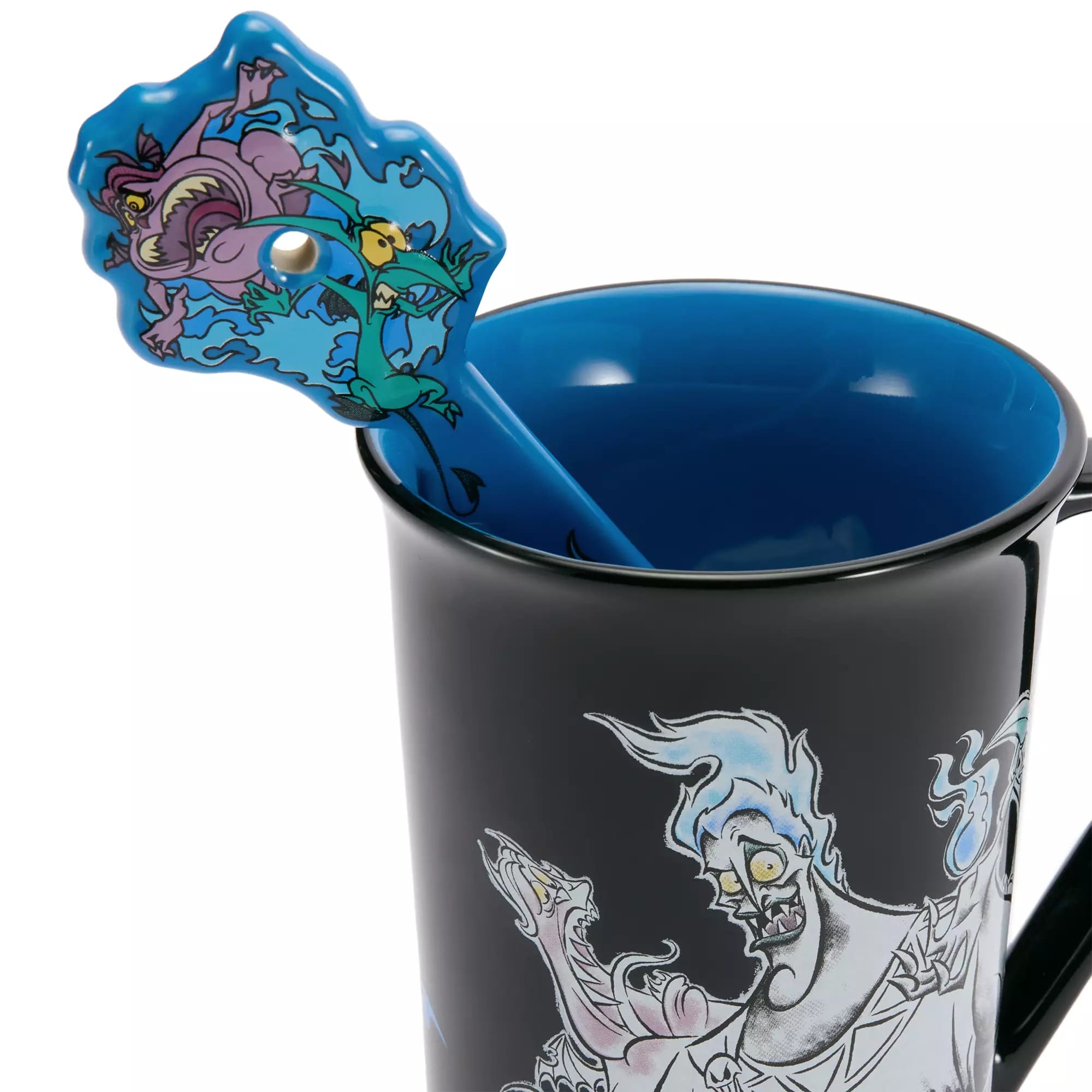 A black mug with a blue interior, featuring Hades and a decorative spoon—perfect for Disney Villains merchandise collectors.