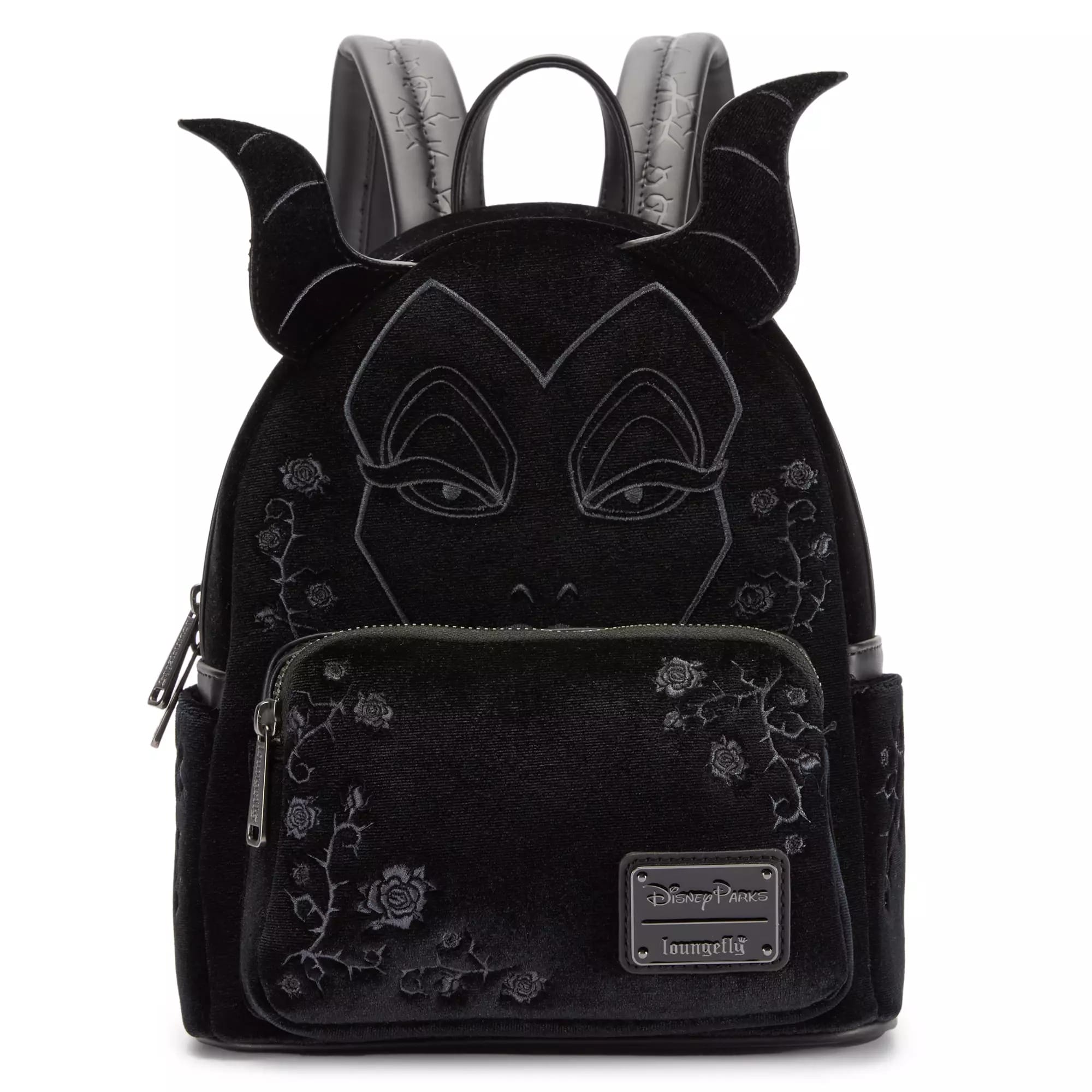A black Disney Villains backpack with Maleficent's face, horns, and floral embroidery on the front and sides.