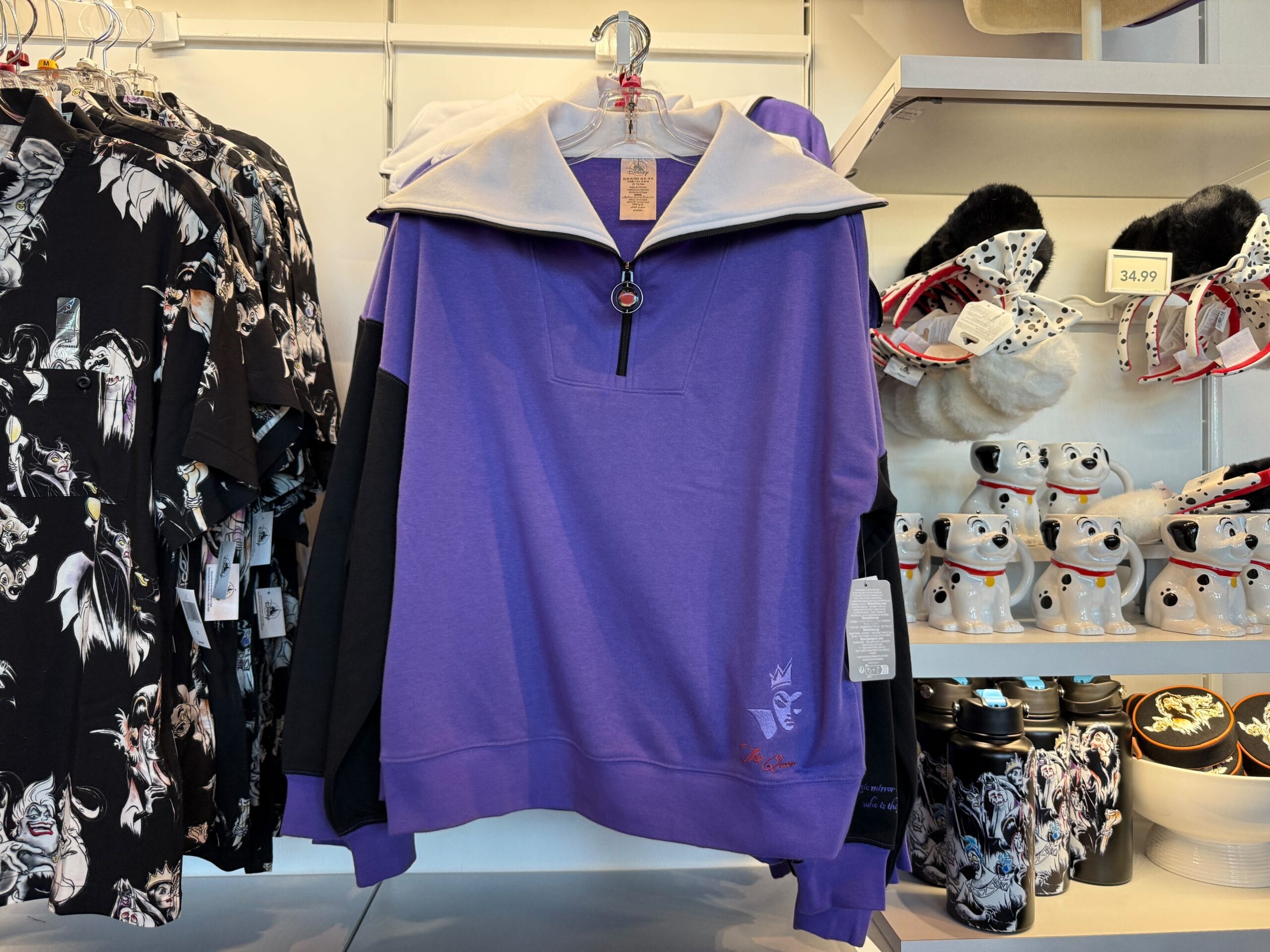 Purple and black pullover with a white collar, inspired by the Evil Queen, from Disneyland Resort’s Villains Apparel collection.