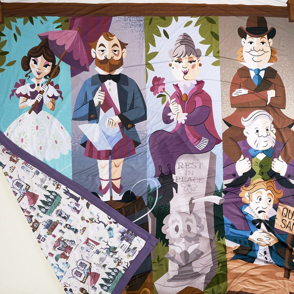 Colorful quilt featuring cartoonish portraits of Victorian characters and gravestones, part of the Haunted Mansion Collection.