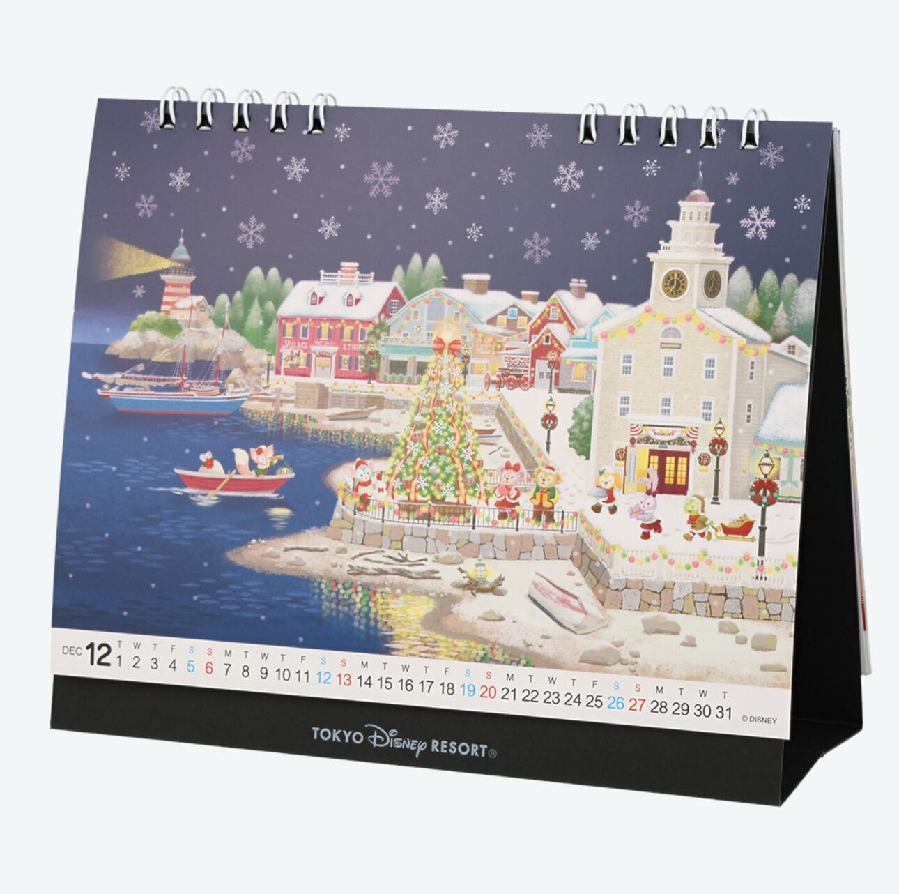 Illustrated December page from 2026 Calendars and Planners featuring a festive town by the water at Tokyo Disney Resort.