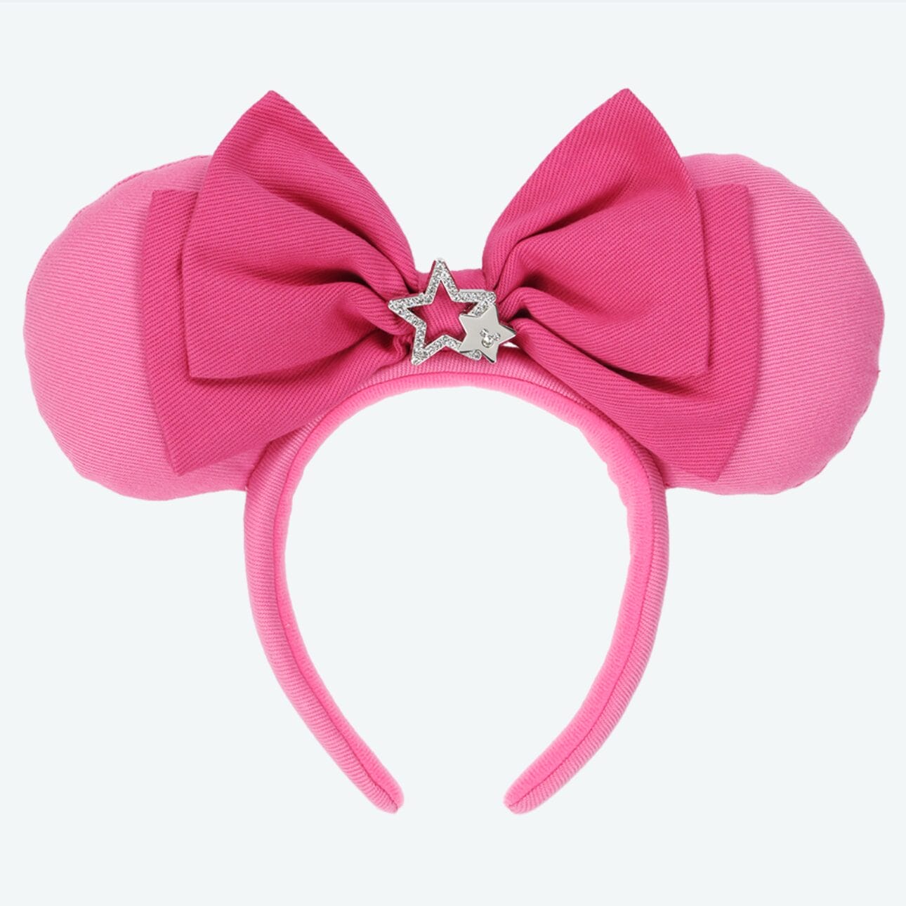 A pink headband with a bow, perfect for Tokyo Disney Resort fans.
