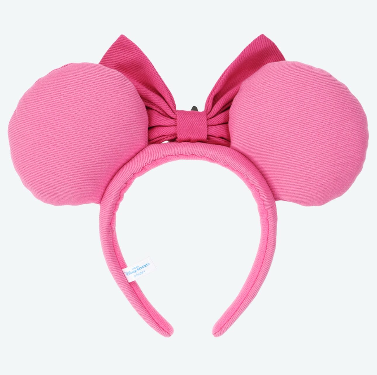 Pink headband with large round mouse ears and a matching pink bow, perfect for Tokyo Disney Resort planners.