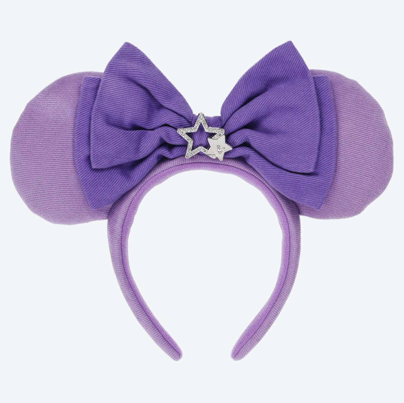 Purple headband from Tokyo Disney Resort with large ears, a big bow, and a silver star in the center.