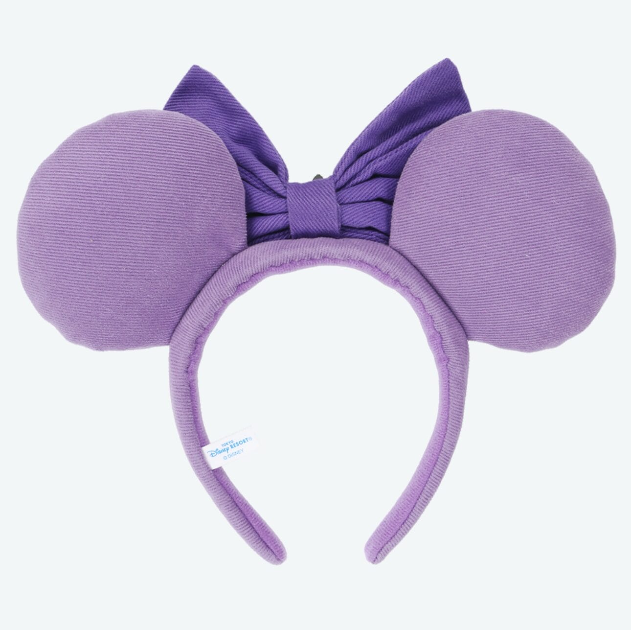 Purple headband with large round mouse ears and a matching bow, inspired by Minnie Mouse at Tokyo Disney Resort.