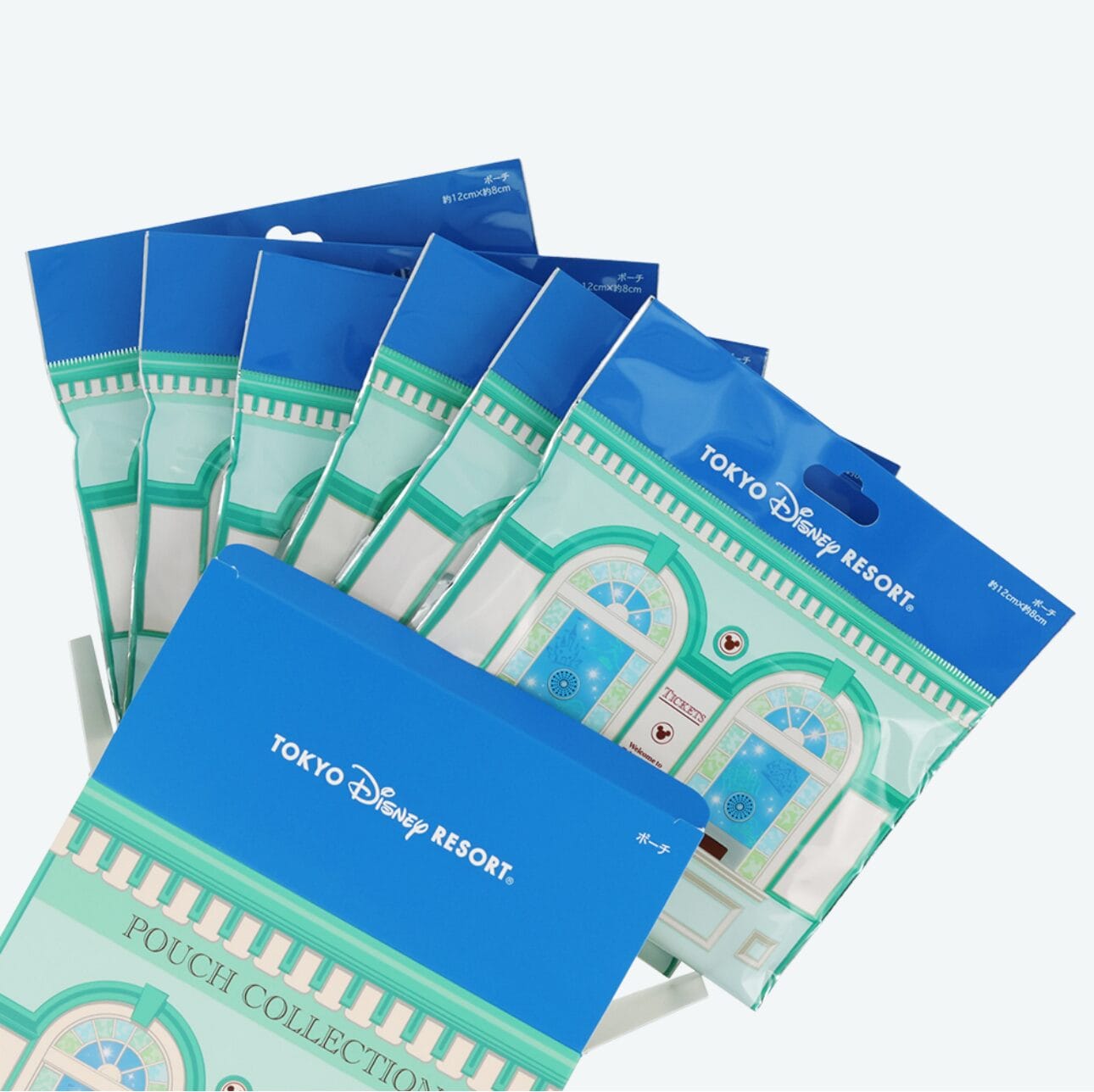 Six Tokyo Disney Resort New Ticket Pouches in blue and white packaging are displayed in a fan arrangement.