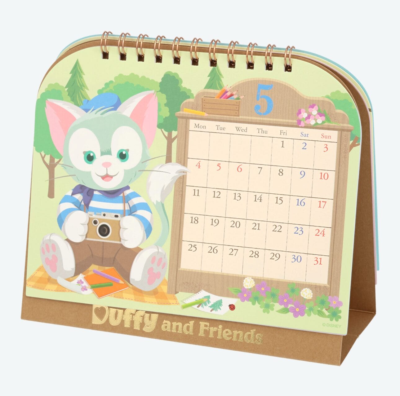 Desk calendar featuring a cartoon kitten with a camera, May page, and "Duffy and Friends" from Tokyo Disney Resort.