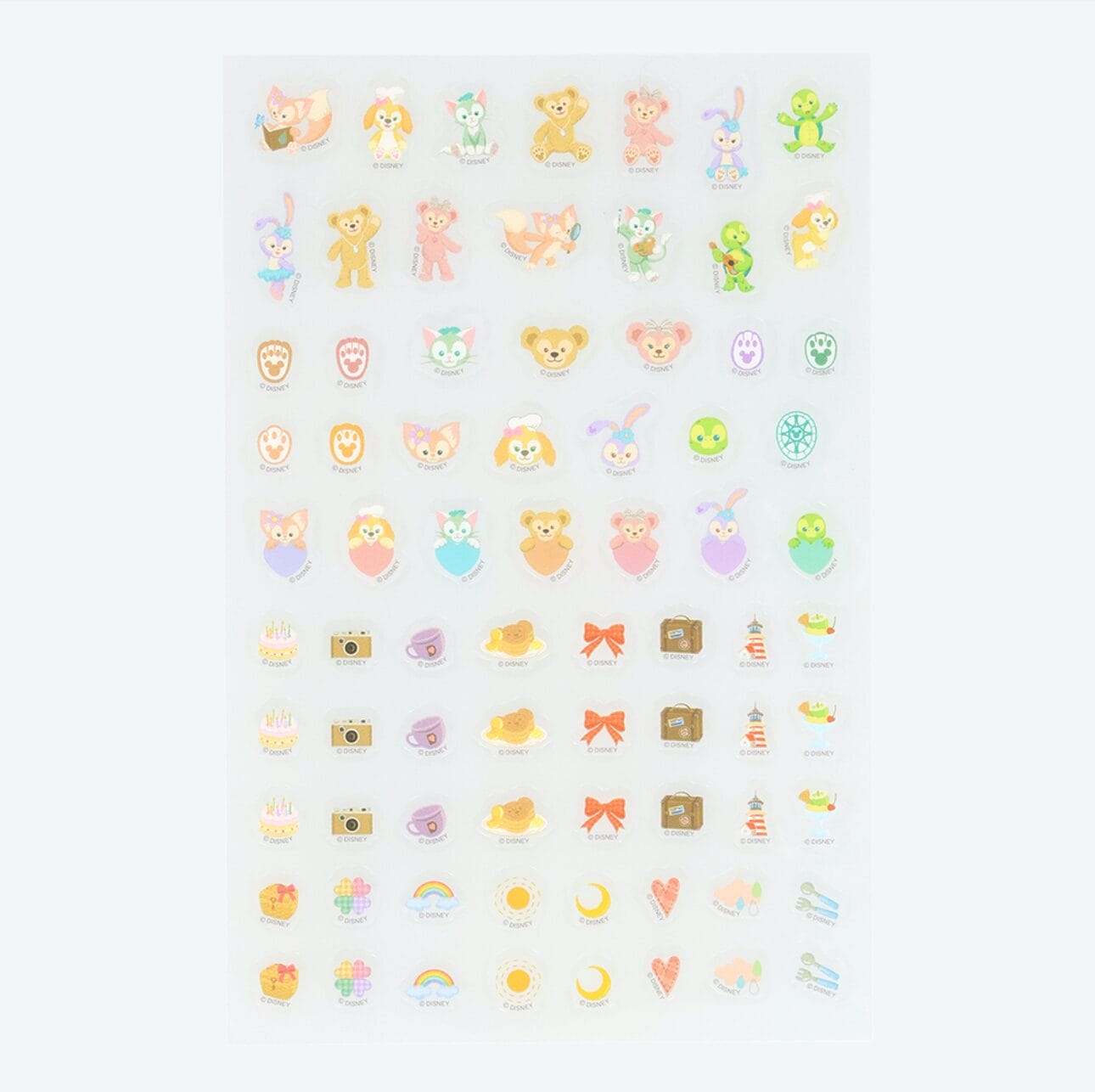 Sheet of colorful stickers for planners or 2026 calendars, featuring cute animals, cakes, hats, and Tokyo Disney Resort icons.