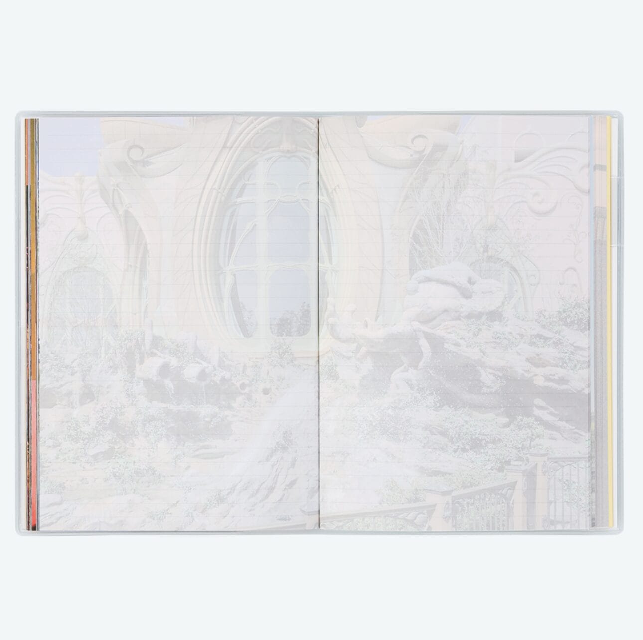 Open book with faint, pastel illustration of Tokyo Disney Resort's whimsical building and garden scene across both pages.