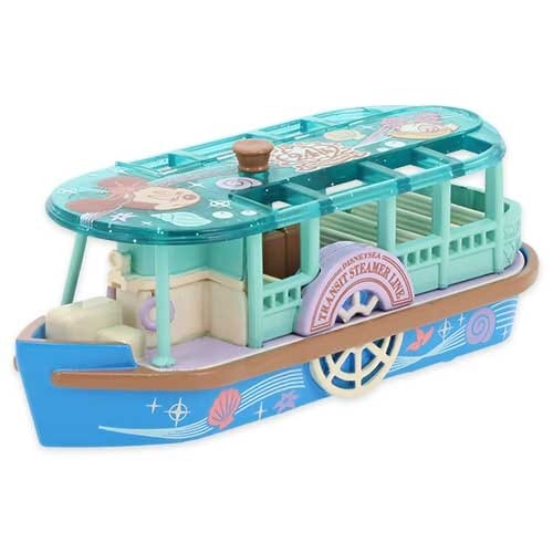 Toy boat with teal roof, blue sides, and decorative seashell designs, resembling a small paddle steamer.
