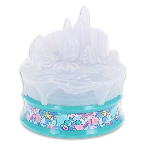 A small toy with a blue base and a translucent, icy mountain design on top, featuring colorful patterns around the edge.