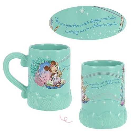 Turquoise mugs with Disney Minnie Mouse in a seashell, and the quote: "The sea sparkles with happy melodies, inviting us to celebrate together.