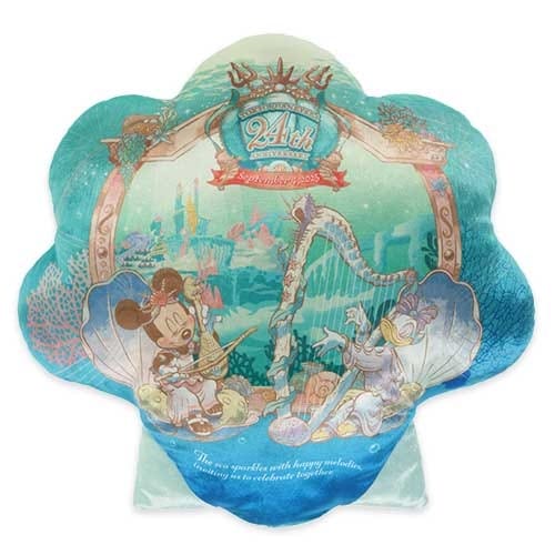 A scallop-shaped Disney 24th anniversary souvenir bag with Mickey and Minnie in an underwater scene.