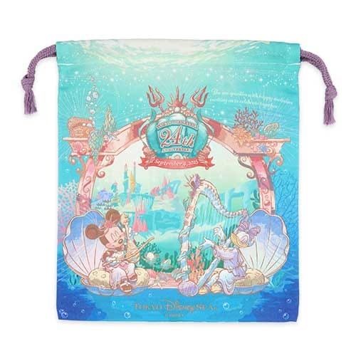 Drawstring bag with underwater design featuring Mickey and Donald in seashells, celebrating Tokyo DisneySea's 21st anniversary.