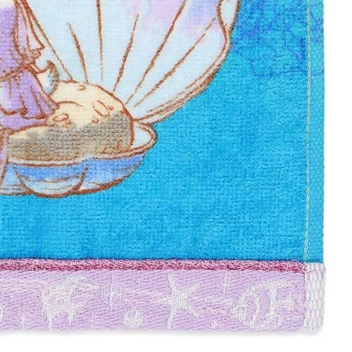 Illustration of a baby sleeping in a seashell on a blue towel with a purple border and white star designs.