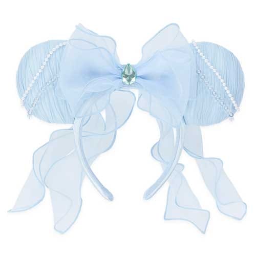 Light blue headband with large sheer bow, gemstone center, draped pearls, and flowing ribbon tails.