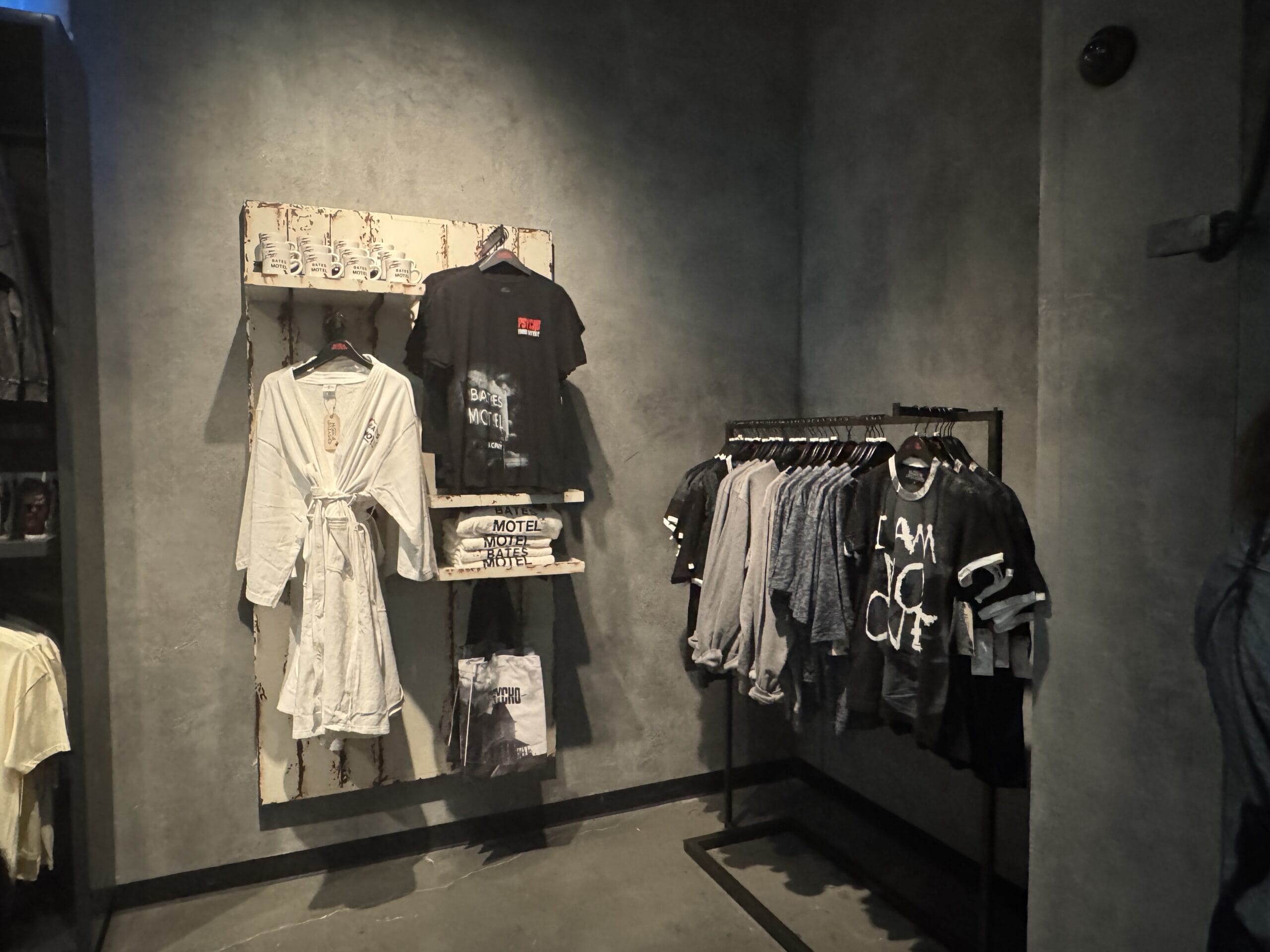 A clothing store display in Las Vegas with black and white shirts, perfect for your Universal Horror Unleashed full tour.