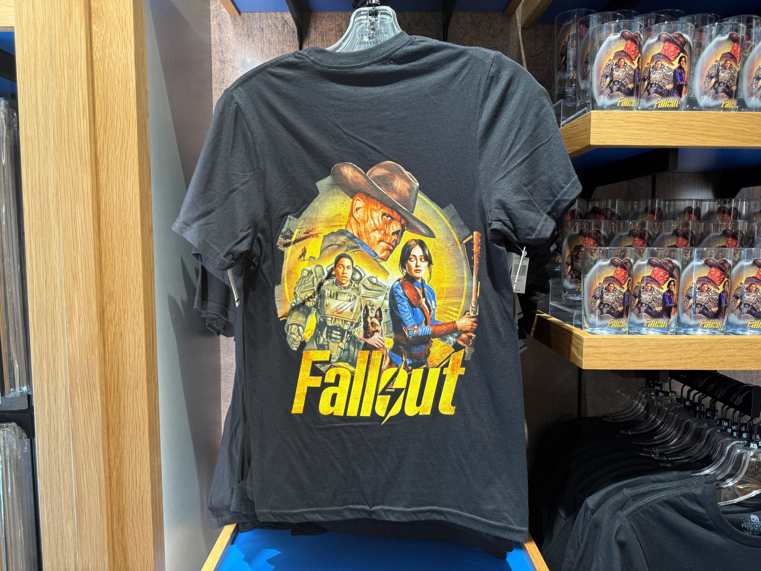 Black T-shirt with Fallout art and logo, part of exclusive HHN Merch at Universal Orlando Resort.