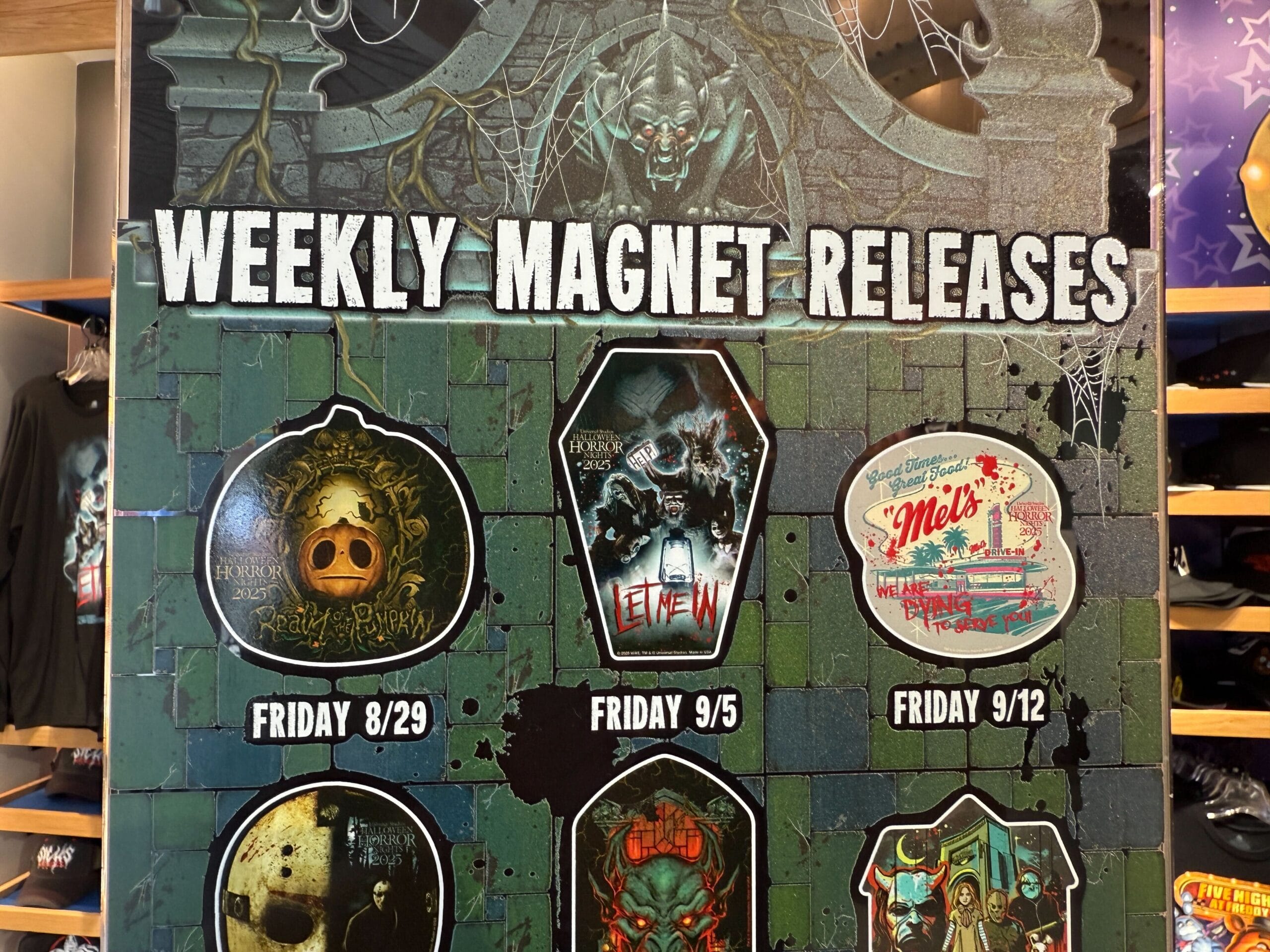 Sign reading "Weekly Magnet Releases" with illustrated HHN merch magnets and release dates: 8/29, 9/5, and 9/12.