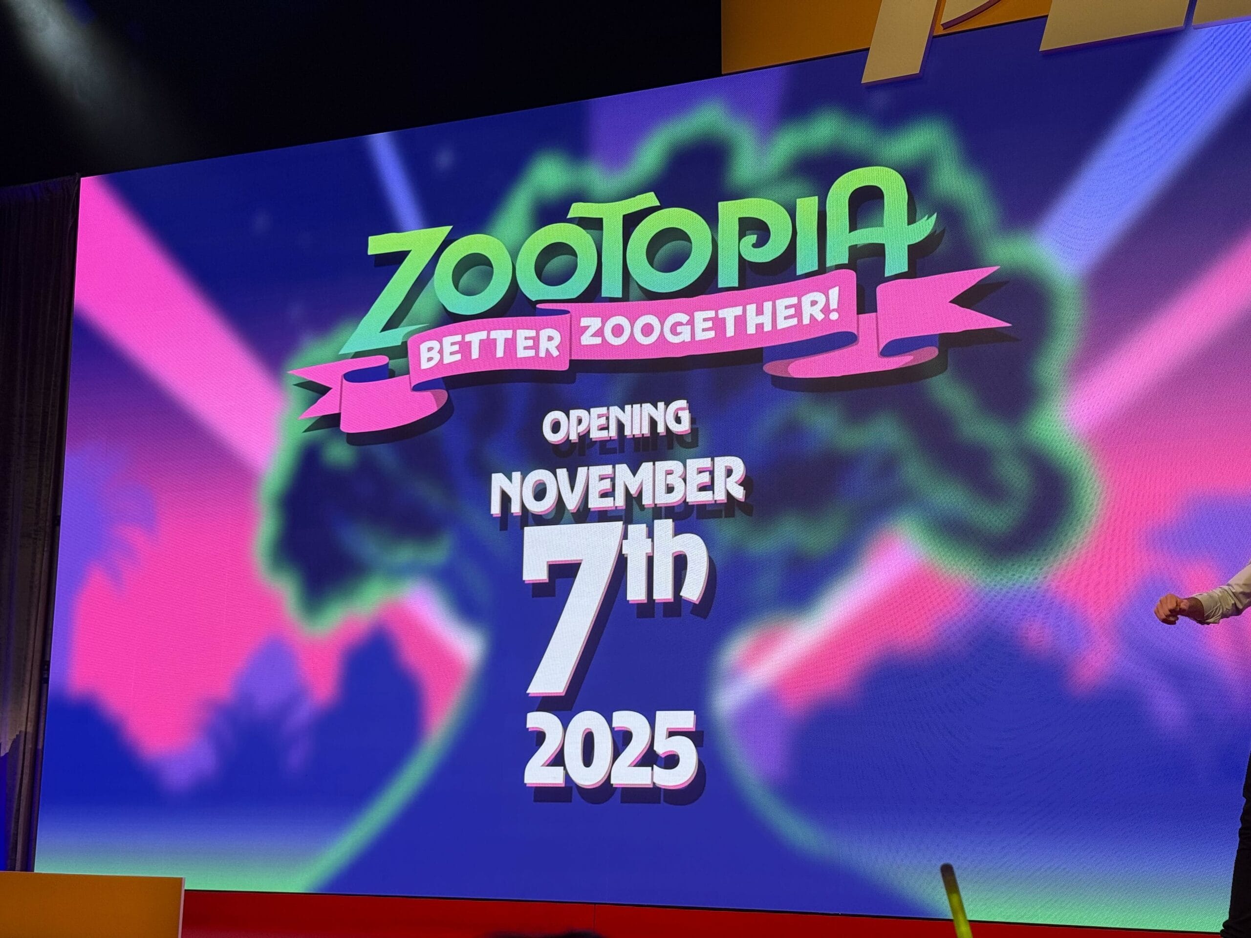 Zootopia “Better Zoogether!” with Carrotvision and a new host character opens Nov 7, 2025, on a colorful tree-filled screen.