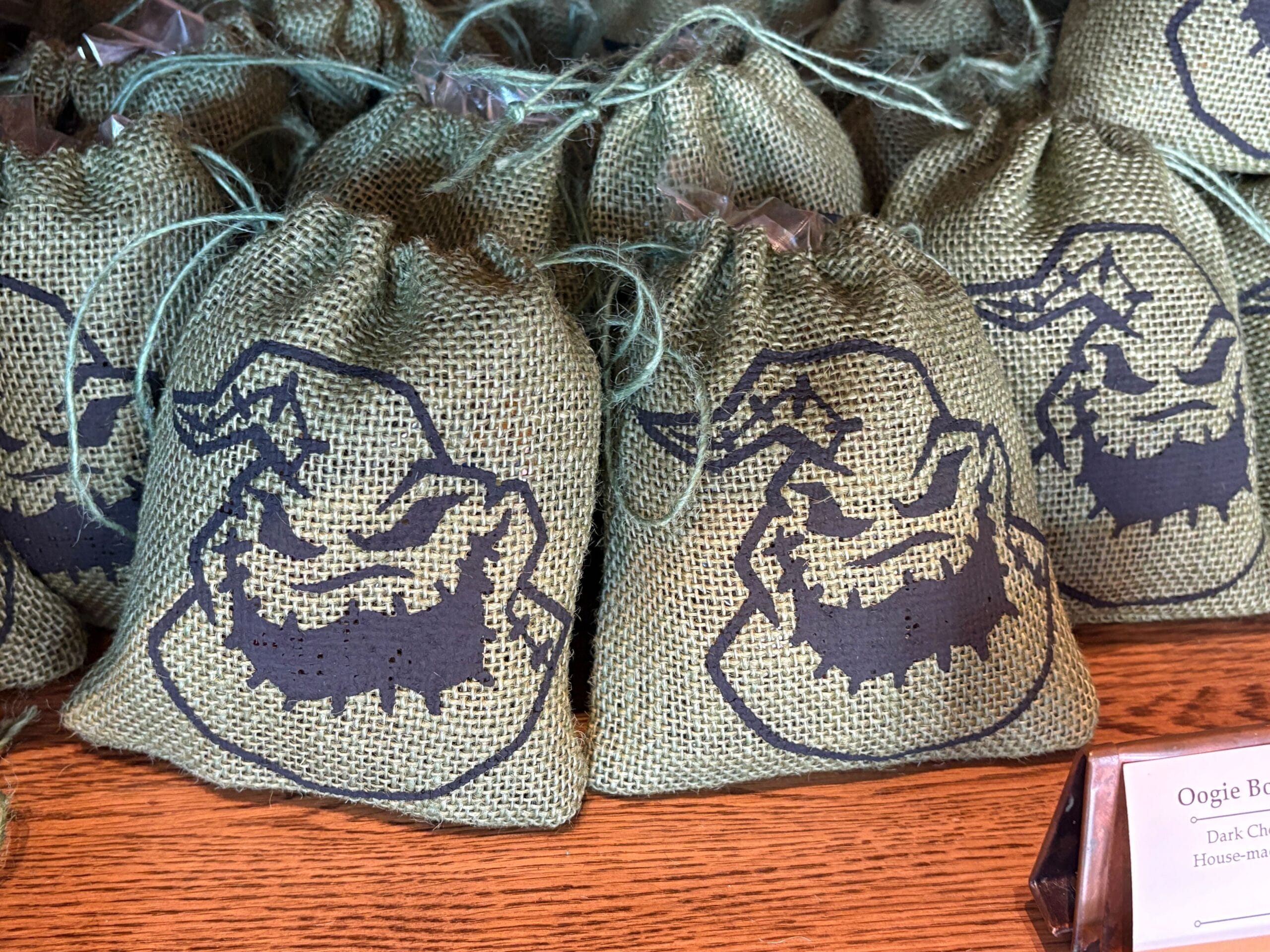 Small burlap bags with Oogie Boogie from "The Nightmare Before Christmas"—a spooky Disney Springs Halloween food find.