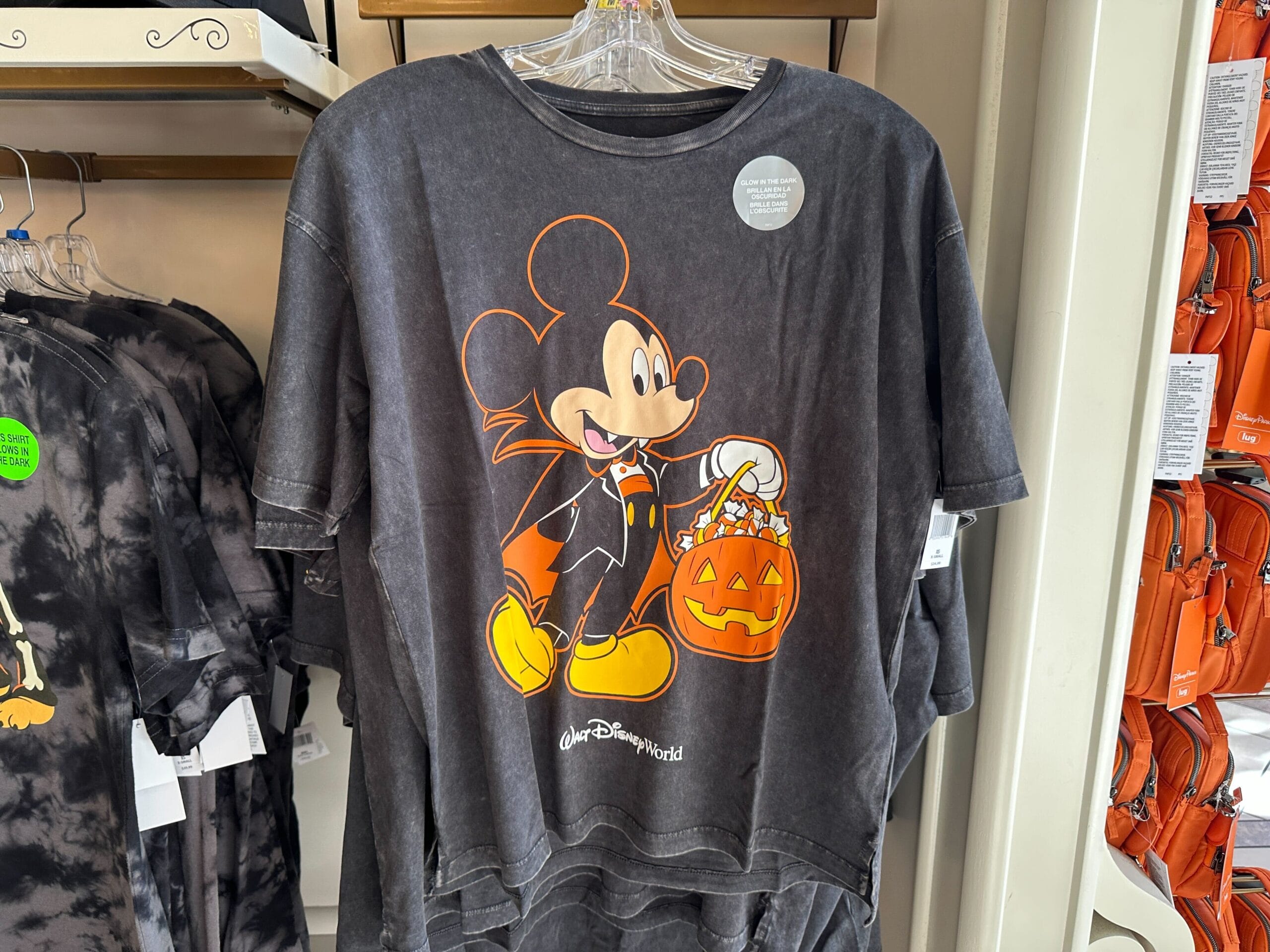 Black T-shirt featuring Mickey Mouse in a vampire costume—perfect Disney Halloween Merch 2025 from Walt Disney World.