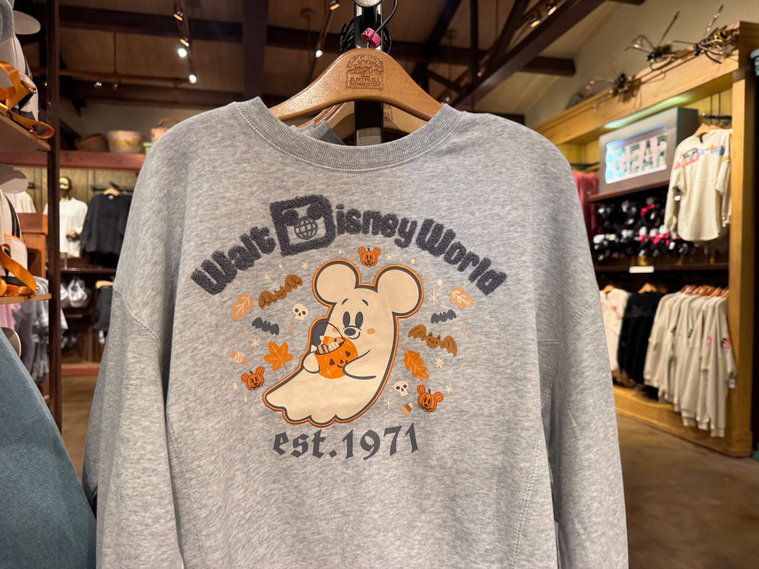 Gray Walt Disney World Halloween merchandise sweatshirt with ghostly Mickey Mouse, candy corn, autumn leaves, and "est. 1971.