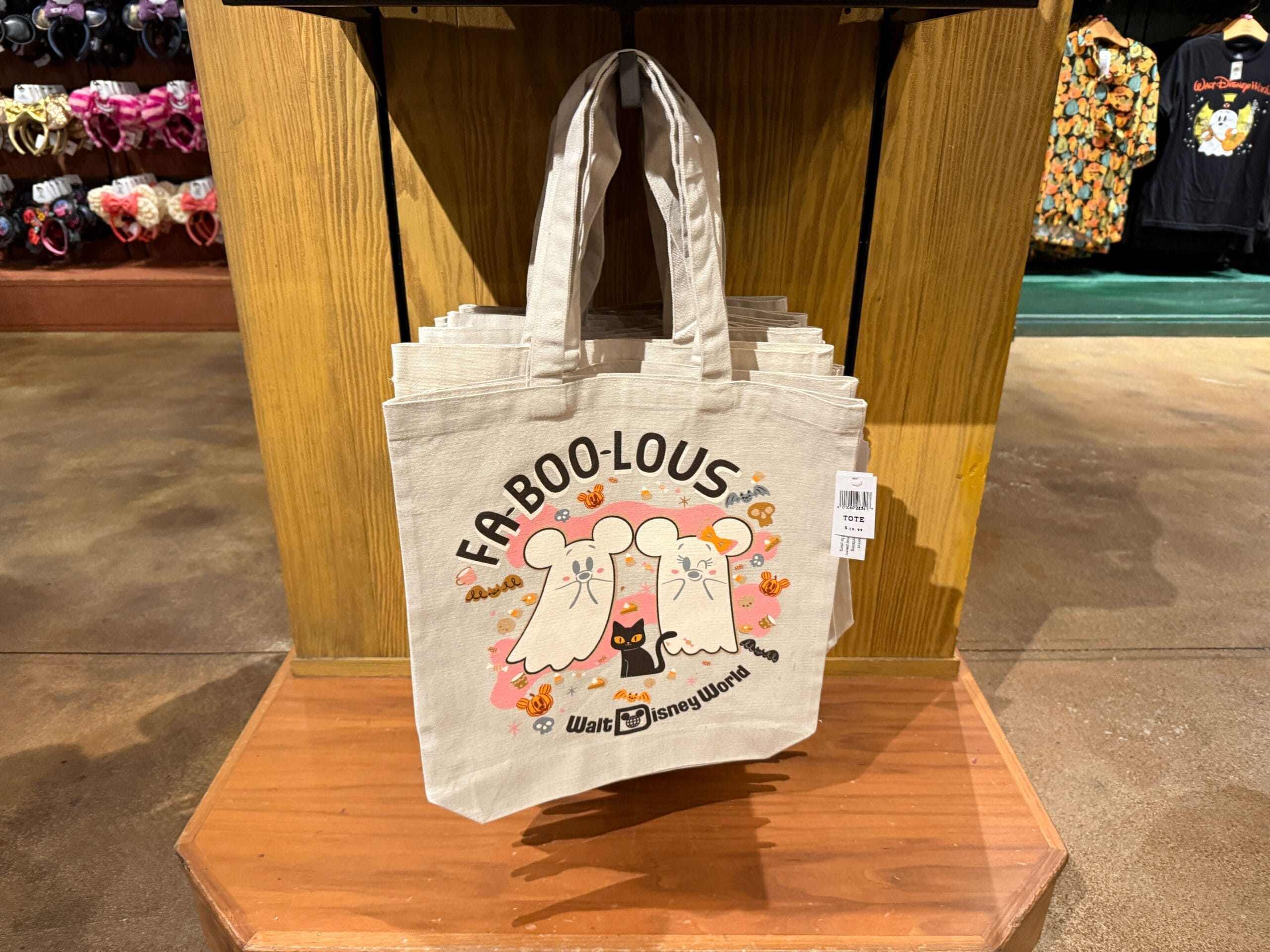 Beige tote bag with ghost designs and "Fa-boo-lous" text, spotted among Disney Halloween Merch 2025 at Walt Disney World.
